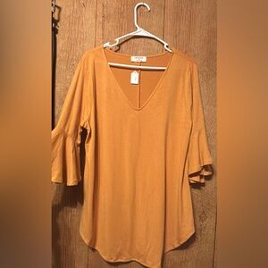 Zenana shirt, size xl and it’s orange.